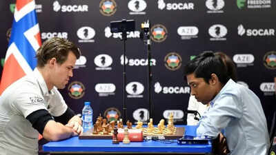 Magnus Carlsen and Praggnanandhaa at a chess event