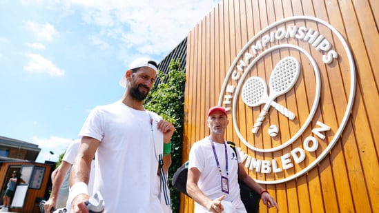Novak Djokovic arrives at the ground of Wimbledon in pursuit of an eighth title.(AP)
